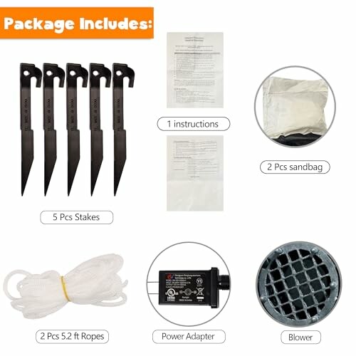 Contents of an inflatable kit including stakes, instructions, sandbags, ropes, power adapter, and blower.